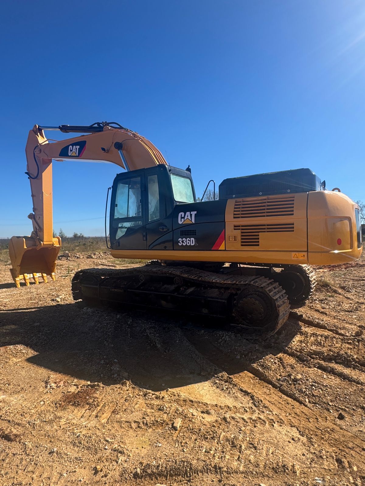 CAT excavator working on a construction site