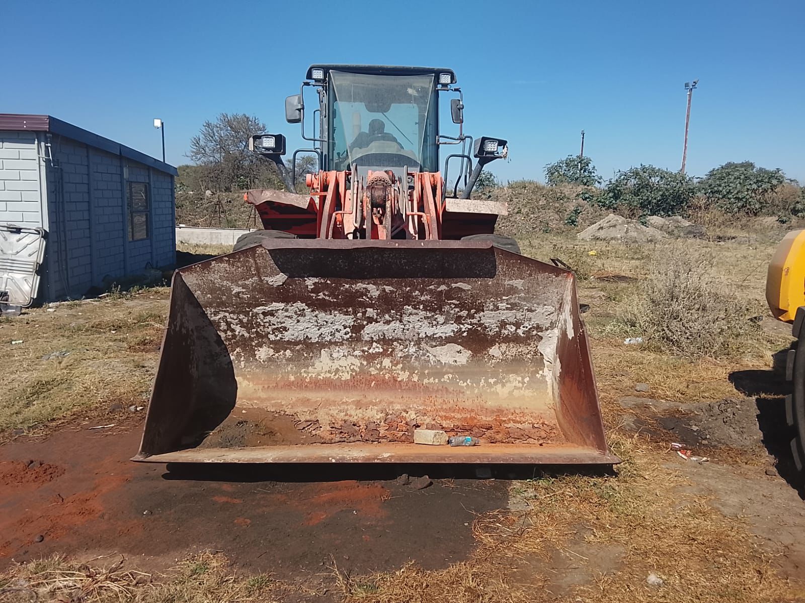 Front end loader bucket at the Faithambition yard