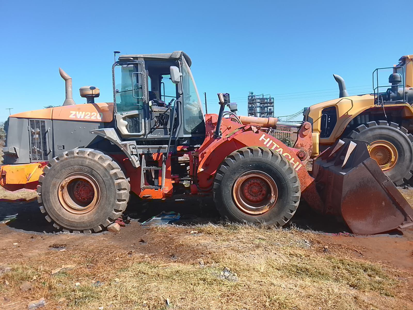 Yellow machinery fleet at Faithambition Project